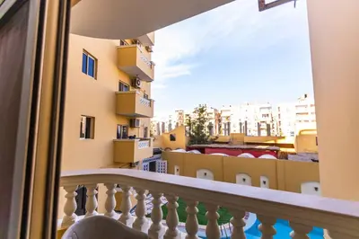 a balcony with a view of a city at Lazur Pool Apartment's - El Kawsar, Hurghada - Egypt in Hurghada