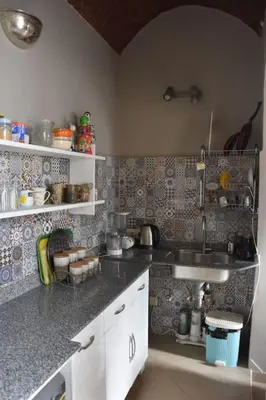 a kitchen with a sink and a counter top at HF - residency in Luxor