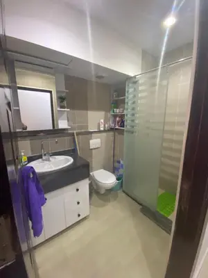 a bathroom with a toilet and a sink and a shower at Hurghada Jungle Clube House Compound 1 bedroom Хургада компаунд студия в Джангл с 1 спальней in Hurghada