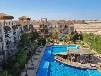arial view of a swimming pool at a resort at Hurghada Jungle Clube House Compound 1 bedroom Хургада компаунд студия в Джангл с 1 спальней in Hurghada