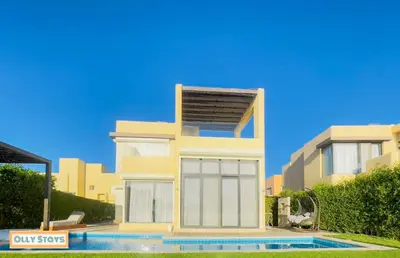 a house with a swimming pool in front of it at Tawila 4BR Villa Private Pool in Hurghada