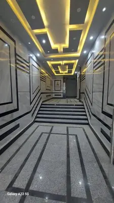 an empty room with a ceiling with lights at الغردقه in Hurghada