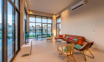 a living room with a couch and chairs at Luxury Villas in Tawila El Gouna in Hurghada