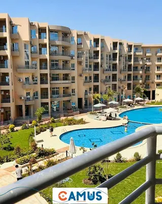 a view of a large apartment complex with a swimming pool at CAMUS 110 A, Princess Resort in Hurghada