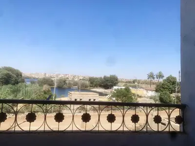 a view from a balcony with a view of a park at Nubian rise in Aswan