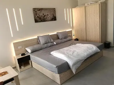 a bedroom with a large bed in a room at scandic resort sea view in Hurghada