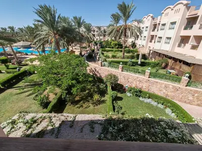 a view from the balcony of a resort at Cozy Sunny Studio with Pool View - Sahl Hasheesh in Hurghada