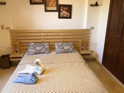 a bedroom with a bed with towels on it at one bedroom ground floor sabina elgouna in Hurghada