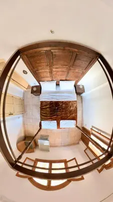 anorthole view of a round building with a spiral at Sunset Haven in Luxor