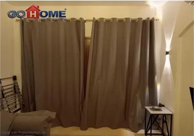 a curtain in the corner of a living room at Comfortable 1 Bedroom at Sabina El-Gouna Y160 in Hurghada