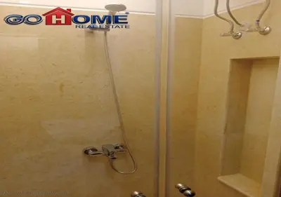 a shower with a glass door in a bathroom at Comfortable 1 Bedroom at Sabina El-Gouna Y160 in Hurghada