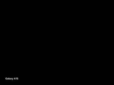 a dark room with a black background with a clock at مطار الاقصر in Luxor