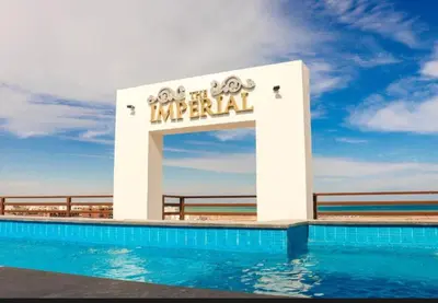 a sign for a hotel with a swimming pool at Imperial Resort Hurghada Studio pool view in Hurghada