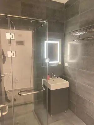 a bathroom with a sink and a shower at Imperial Resort Hurghada Studio pool view in Hurghada