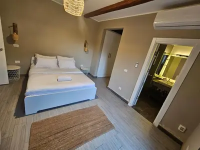 a bedroom with a large bed in a room at one bedroom in gouna in Hurghada
