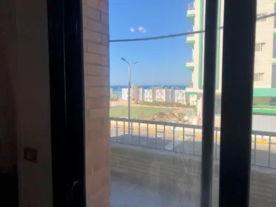 a view of a city street from a window at Apartment sea view in Hurghada
