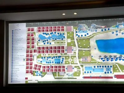 a map of a resort with a swimming pool at studio in a 5 star hotel in Hurghada