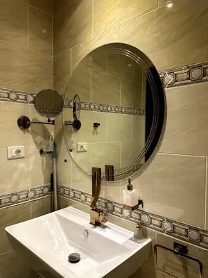 a bathroom with a sink and a mirror at studio in a 5 star hotel in Hurghada