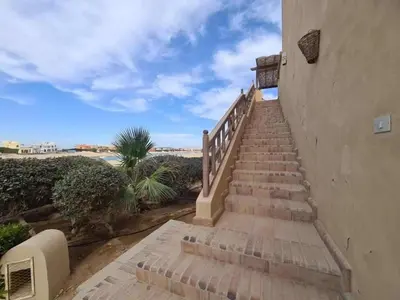 a stairway leading up to a building with the beach at Sabina Y97- 23 in Hurghada
