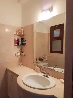 a bathroom with a sink and a mirror at Sabina Y97- 23 in Hurghada