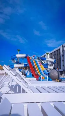 a water park with a colorful water slide at Fanadir Bay Resort in Hurghada