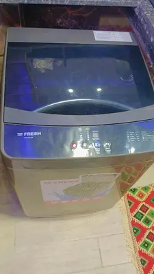 a video game console sitting on top of a table at Memo home in Jazīrat al ‘Awwāmīyah