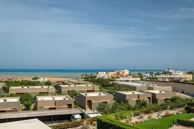 an aerial view of a city with buildings and the ocean at Fanadir 3BR • Prime Sea View Villa in Hurghada