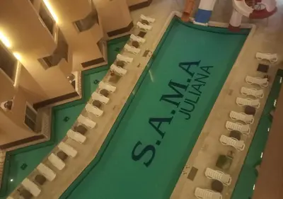 a lego swimming pool with the word vacation on it at Juliana beach resort in Hurghada
