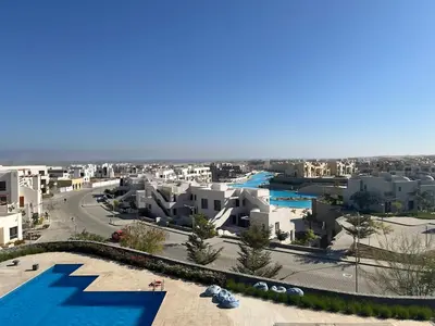an aerial view of a city with buildings at Makadi heights - phase 2 in Hurghada