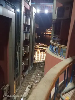 a view from the balcony of a room with buckets at شقة في موا بلازا كورنيش النيل اسوان Apartment in Mowa Plaza Aswan Nile Corniche in Aswān