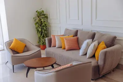 a living room with a couch and two chairs and a table at Sky Star Hotel free shuttle to Hurghada City Center in Hurghada