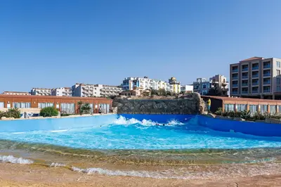 a water slide in the middle of a city at Sunrise Alora Aqua Park Resort in Hurghada