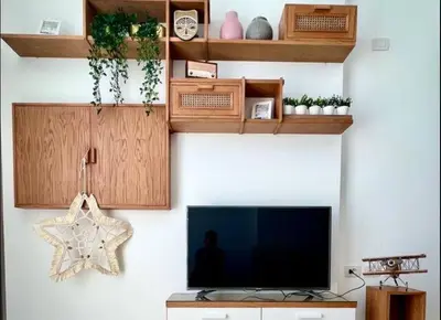 a living room with a flat screen tv on a wall at Luxury One bedroom in gouna in Hurghada