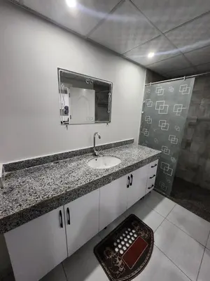 a bathroom with a sink and a mirror at Scandic Resort Hurghada in Hurghada