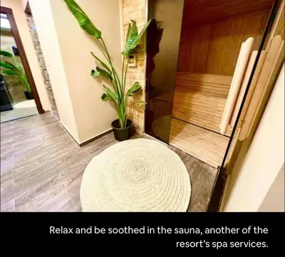 a bathroom with a shower and a rug at Studio Imperial resort pool view in Hurghada