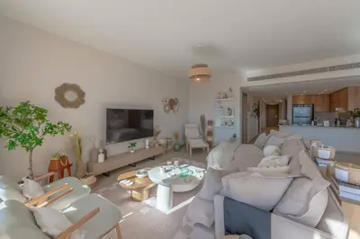 a living room with a couch and a table at Stylish 3 BR Retreat at Ancient Hills El Gouna in El Gouna