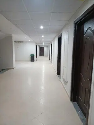 an empty hallway of an office building with a long corridor at Sunset View at scandic Beach WIFI in Hurghada