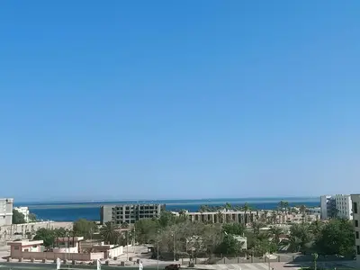 a view of a city with the ocean in the background at Hurghada Escape Pool and Sea View in Hurghada