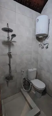 a bathroom with a toilet and a sink at Kemet Guest House in Aswan