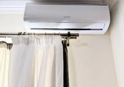 a curtain rod with a air conditioner at Fanta Sea Studio with private jacuzzi - Al Ahyaa in Hurghada