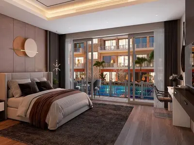 a bedroom with a large bed and a balcony at Studio in a touristic area - Al mamsha in Hurghada