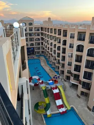 an aerial view of an apartment complex with a pool at Hurghadiansrealty in Hurghada