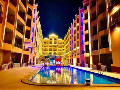 a large swimming pool in the middle of a building at Hurghadiansrealty in Hurghada