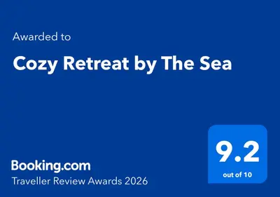 a blue sign with the text converted to cozy retreat by the sea at Cozy Retreat by The Sea in Safaga
