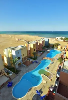 an aerial view of a resort with a swimming pool at Home from Home Al Dora Residence in Hurghada