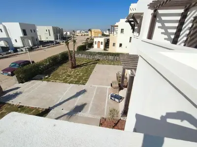 a car parked on the side of a building at Stay at elgouna with private heated pool villa in Hurghada