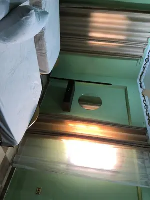 an overhead view of a ceiling with a light on it at Habu Garden Apartment in Luxor