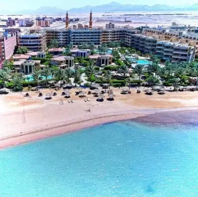an aerial view of a beach with chairs and umbrellas at Palma Resort A155 Chalet Hurghada in Hurghada