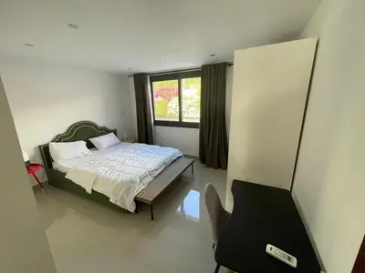 a bedroom with a bed and a window at GCribs in Hurghada