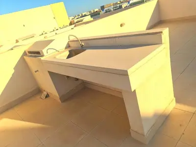 a white sink in a room with a counter at Mangrove Elgouna in Hurghada